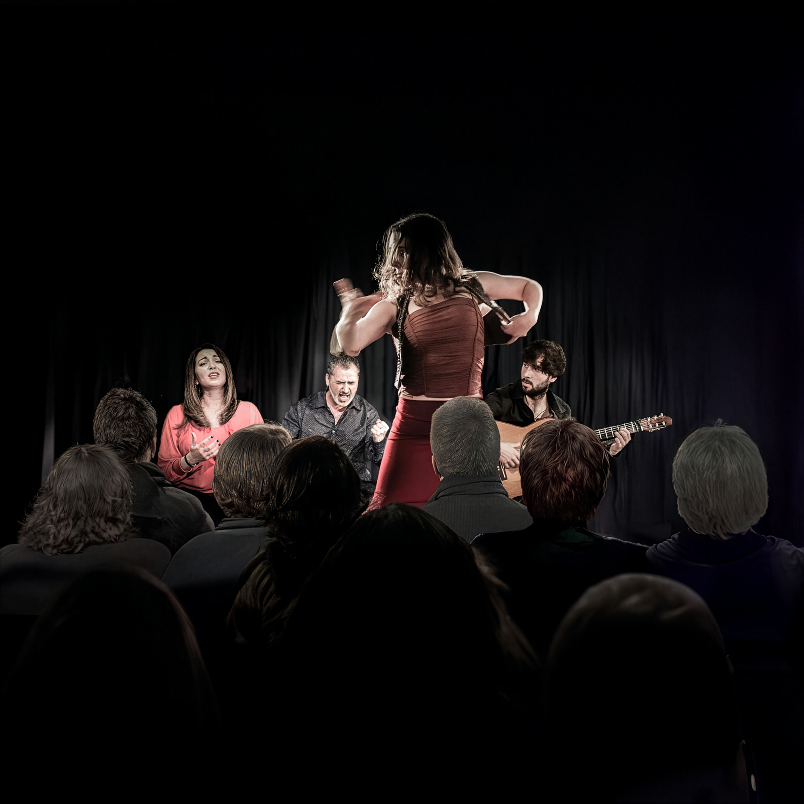 The Herencia flamenco tablao seen from the audience: cante, guitar and dance on stage