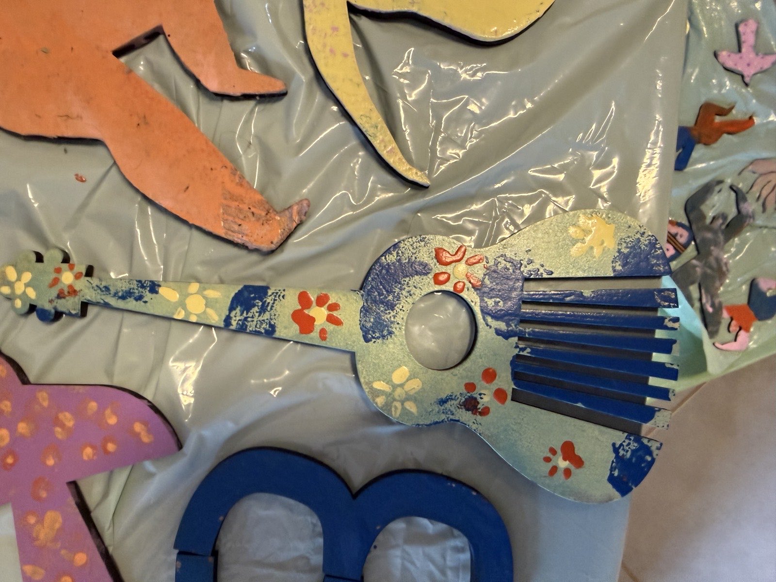 Shapes painted by pupils and residents to decorate the book tree